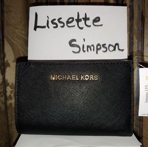 Jet Set Travel Bi-fold Zip Coin Wallet in Black